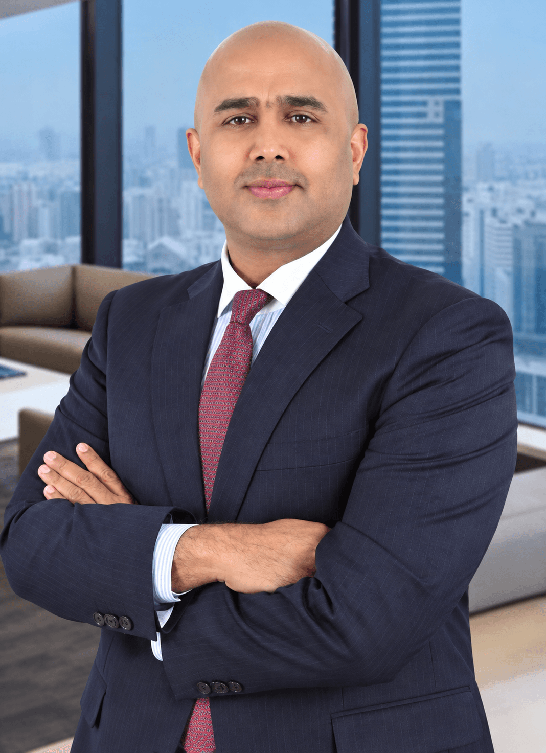 Portrait of Mr. Sameer Mohamed, Chief Executive Officer